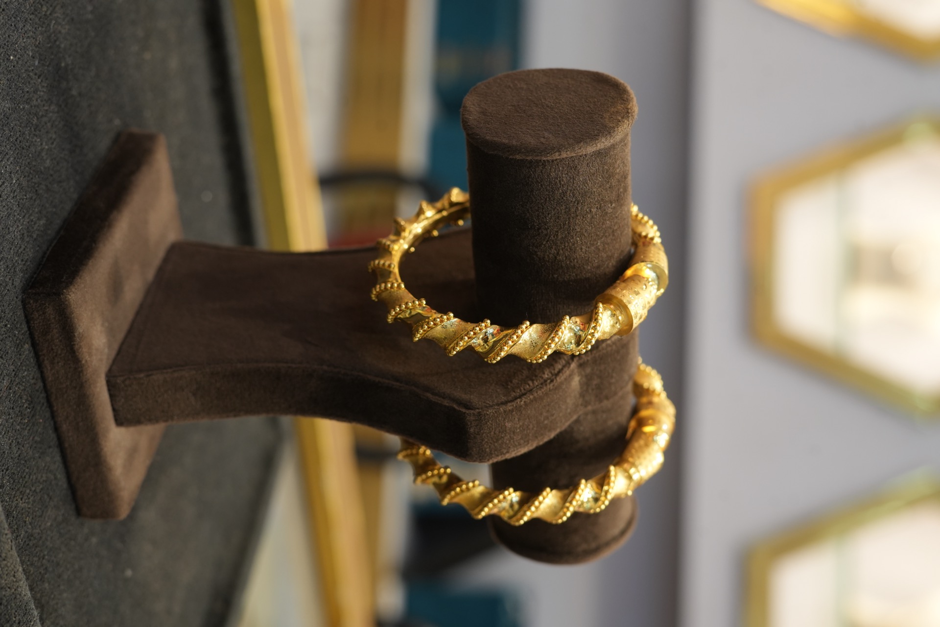 Gold bangles with traditional twist