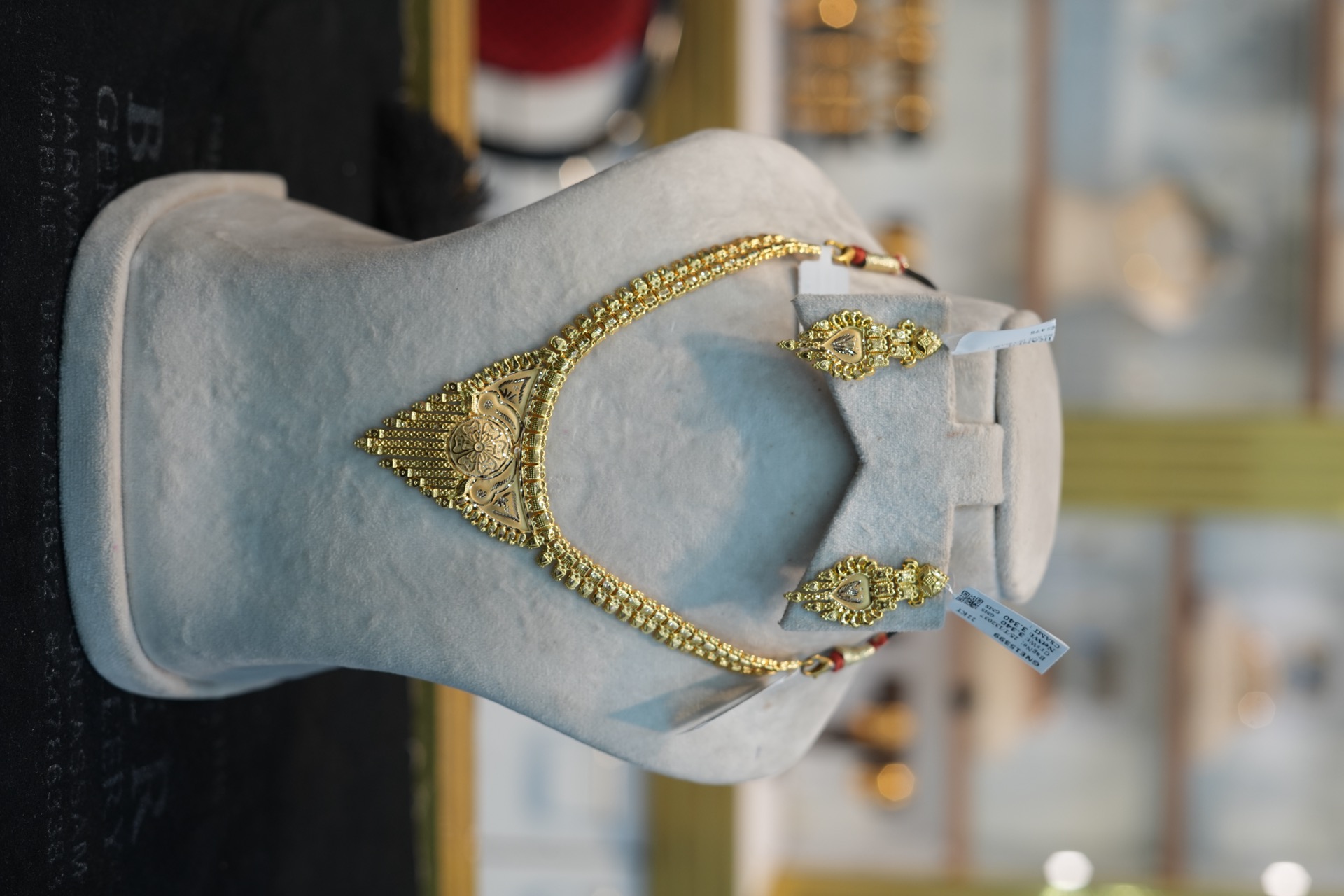 Traditional Assamese gold necklace and earrings