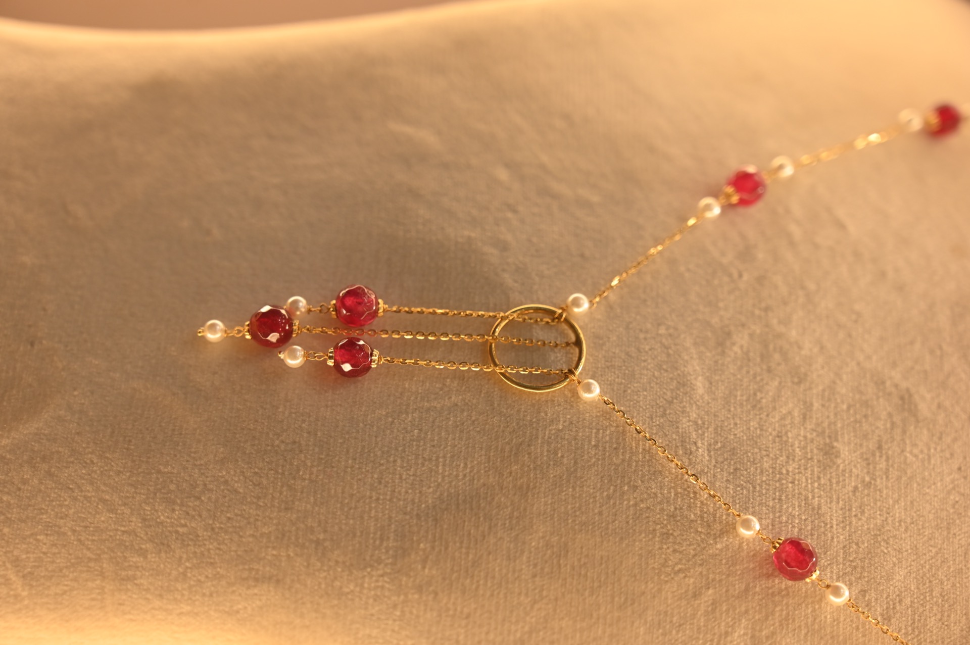 Ruby pendant earring